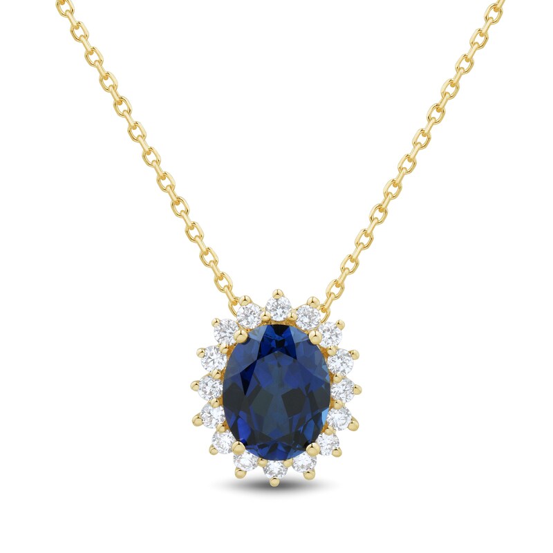 Main Image 1 of Oval Blue Lab-Created Sapphire and 1/3 CT. T.W. Certified Lab-Grown Diamond Sunburst Frame Pendant in 10K Gold