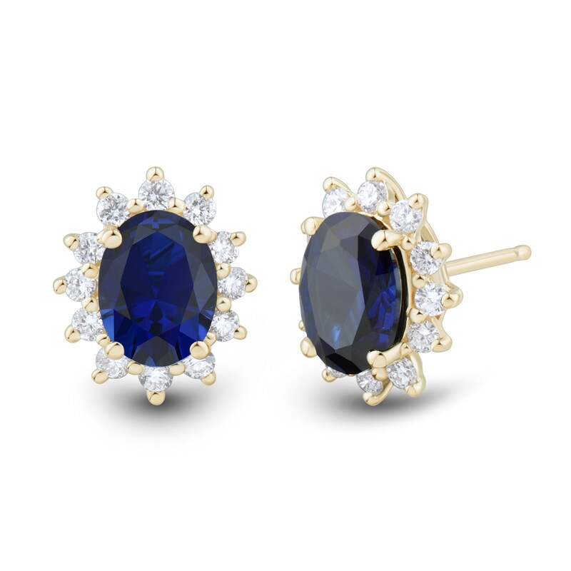 Main Image 1 of Oval Blue Lab-Created Sapphire and 1/2 CT. T.W. Certified Lab-Grown Diamond Starburst Stud Earrings in 10K Gold