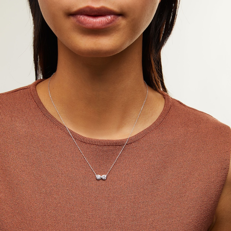 Main Image 2 of Zales x Nungu 3/8 CT. T.W. Diamond Infinity Necklace in 14K White Gold