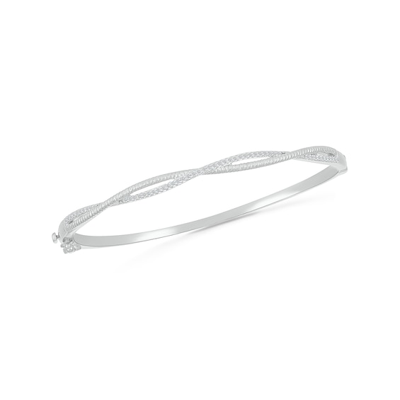 1/4 CT. T.w. Diamond and Rope-Textured Ribbon Twist Bangle in 10K Gold