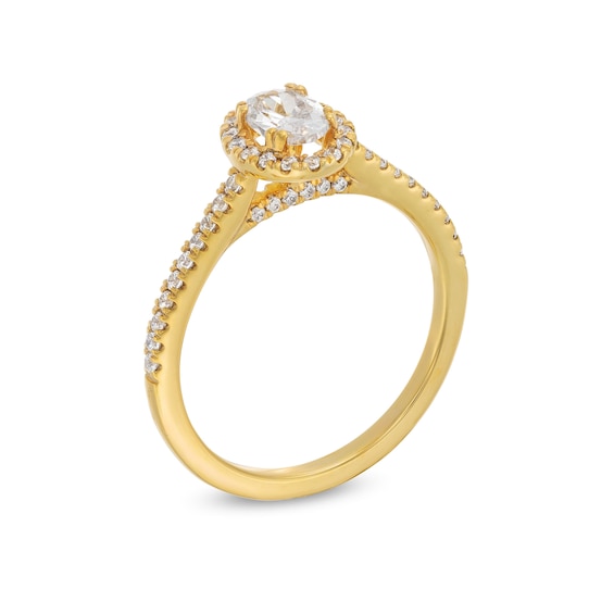 3/4 CT. T.w. Oval Diamond Frame Engagement Ring in 14K Gold