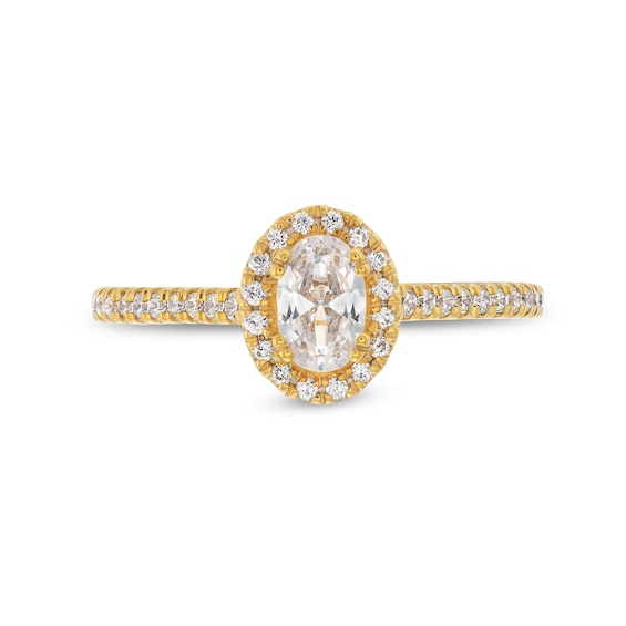 3/4 CT. T.w. Oval Diamond Frame Engagement Ring in 14K Gold