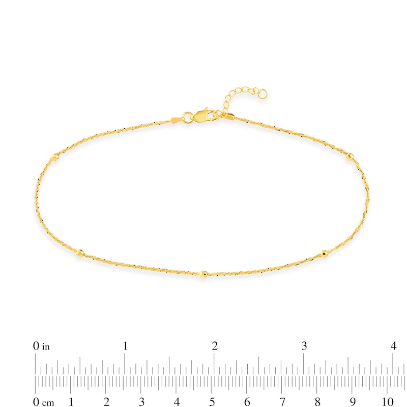 Main Image 4 of 1.15mm Diamond-Cut Brilliance Bead Station Curb Chain Anklet in Solid 14K Gold - 10"