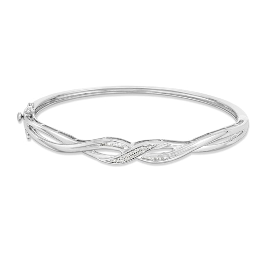 1/5 CT. T.w. Baguette and Round Diamond Infinity Twist Bangle in Sterling Silver - 7.84"