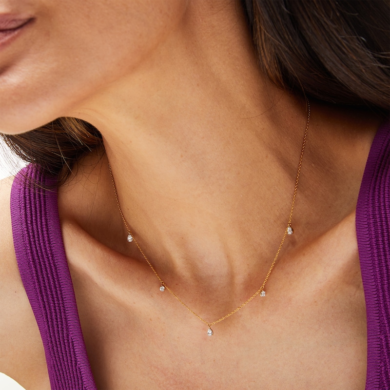 Main Image 2 of 1/4 CT. T.W. Pear-Shaped and Round Diamond Station Dangle Necklace in 10K Gold