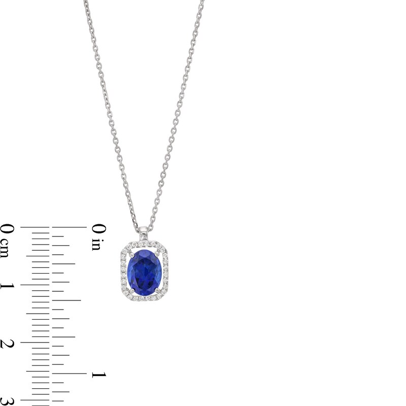 Main Image 3 of Oval Blue Lab-Created Sapphire and 1/10 CT. T.W. Diamond Open Octagon Frame Pendant in 10K White Gold