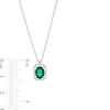 Thumbnail Image 3 of Oval Lab-Created Emerald and 1/10 CT. T.W. Diamond Open Octagon Frame Pendant in 10K White Gold