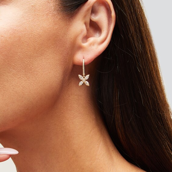 5/8 CT. T.w. Baguette and Round Diamond Flower Dangle Earrings in 10K Gold