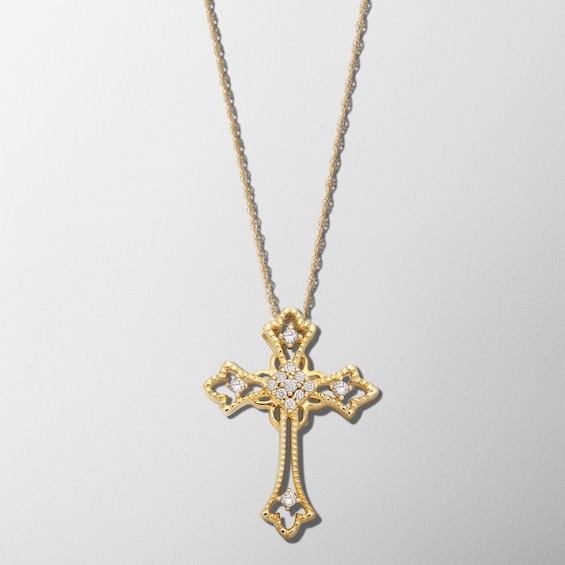 1/10 CT. T.w. Diamond Trefoil-Ends Open Cross Pendant in 10K Gold