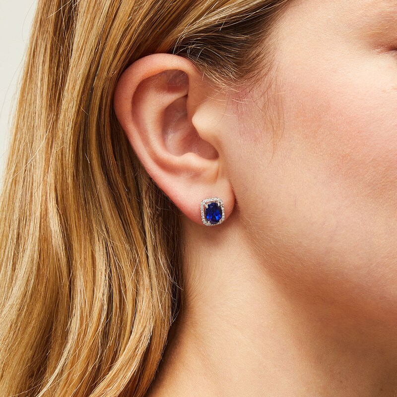 Main Image 2 of Oval Blue Lab-Created Sapphire and 1/6 CT. T.W. Diamond Open Octagon Frame Stud Earrings in 10K White Gold