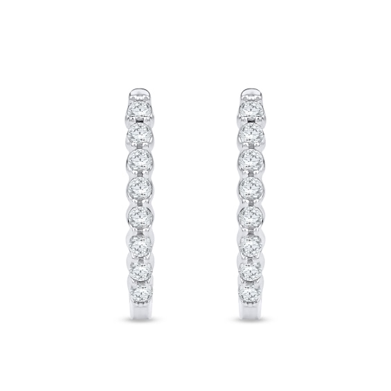 1/2 CT. T.w. Diamond Oval Hoop Earrings in 10K White Gold