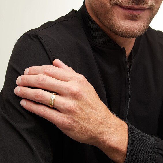 1/5 CT. T.w. Diamond Graduated Rolling Groove Anniversary Band in 10K Gold