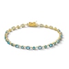 Thumbnail Image 1 of Oval and Round Swiss Blue Topaz Alternating Link Bracelet in Sterling Silver with 18K Gold Plate - 7.25”