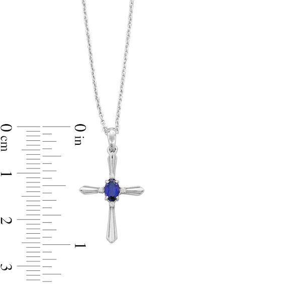 Oval Blue Lab-Created Sapphire and Diamond Accent Cross Pendant in Sterling Silver