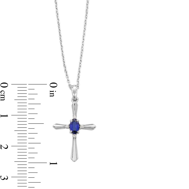 Main Image 4 of Oval Blue Lab-Created Sapphire and Diamond Accent Cross Pendant in Sterling Silver