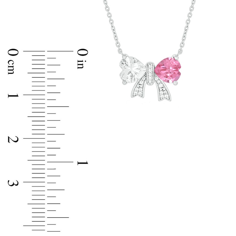 Main Image 2 of 6.0mm Heart-Shaped Pink and White Lab-Created Sapphire with 1/20 CT. T.W. Diamond Bow Necklace in Sterling Silver