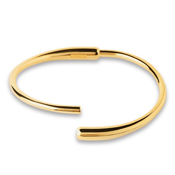 PDPAOLAâ¢ at Zales Graduated Loop Bangle in Brass with 18K Gold Plate - 6.83"