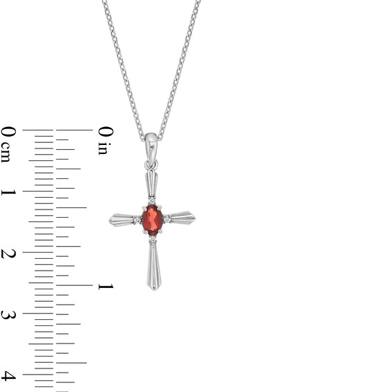 Oval Garnet and Diamond Accent Flared Cross Pendant in Sterling Silver