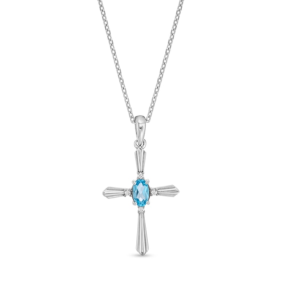 Oval Swiss Blue Topaz and Diamond Accent Flared Cross Pendant in Sterling Silver