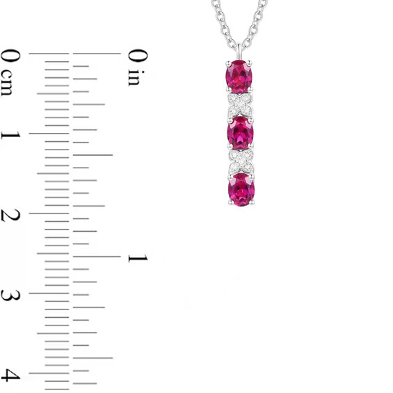 Oval Lab-Created Ruby and White Lab-Created Sapphire Four Piece Jewelry Set in Sterling Silver - Size 7
