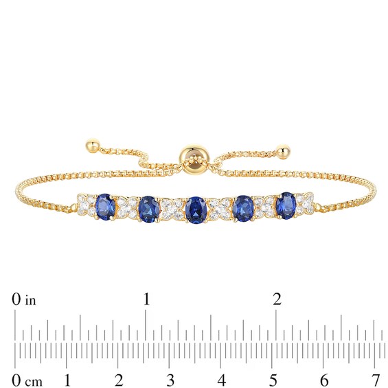 Oval Blue and White Lab-Created Sapphire Four Piece Jewelry Set in Sterling Silver with 14K Gold Plate - Size 7