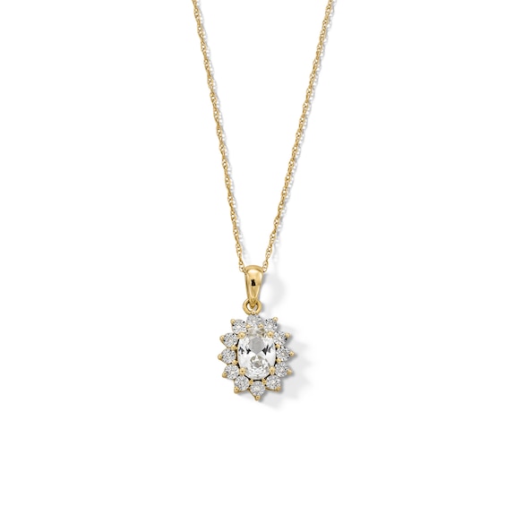 Oval White Lab-Created Sapphire and Diamond Accent Sunburst Frame Pendant in 10K Gold