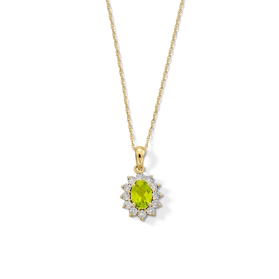 Oval Peridot and Diamond Accent Sunburst Frame Pendant in 10K Gold