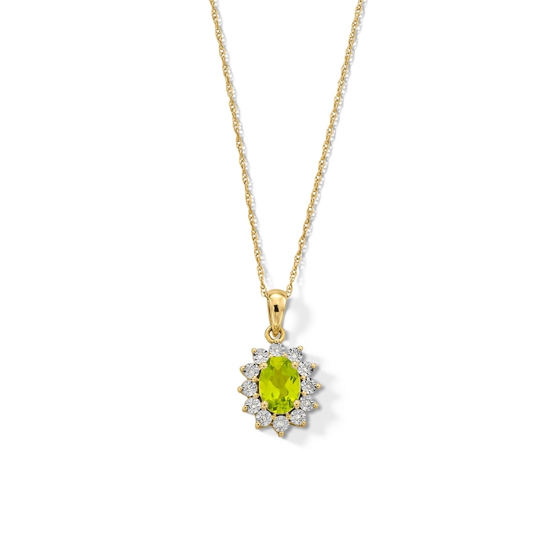 Main Image 1 of Oval Peridot and Diamond Accent Sunburst Frame Pendant in 10K Gold