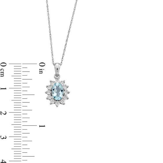 Oval Aquamarine and Diamond Accent Sunburst Frame Pendant in 10K White Gold