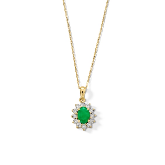 Oval Emerald and Diamond Accent Sunburst Frame Pendant in 10K Gold