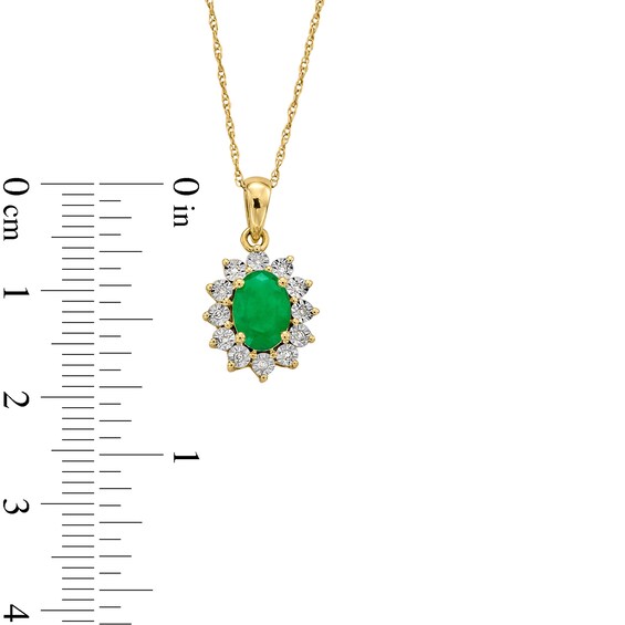 Oval Emerald and Diamond Accent Sunburst Frame Pendant in 10K Gold