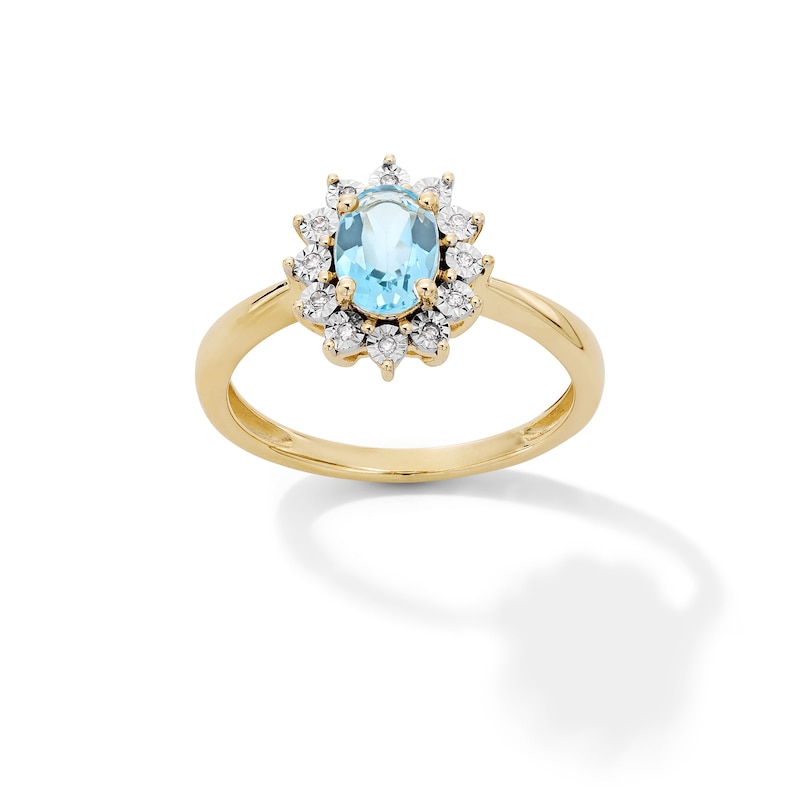 Main Image 1 of Oval Swiss Blue Topaz and Diamond Accent Sunburst Frame Ring in 10K Gold