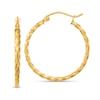 Thumbnail Image 1 of 26.65mm Twist Textured Hoop Earrings in Hollow 10K Gold