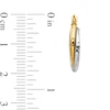 Thumbnail Image 2 of 19.0mm Textured Crossover Double Hoop Earrings in Hollow 10K Two-Tone Gold