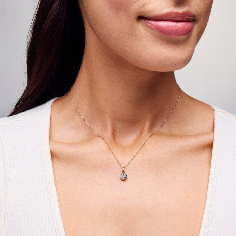 Main Image 2 of 1/4 CT. Diamond Solitaire Swirl Frame Pendant in 10K Gold
