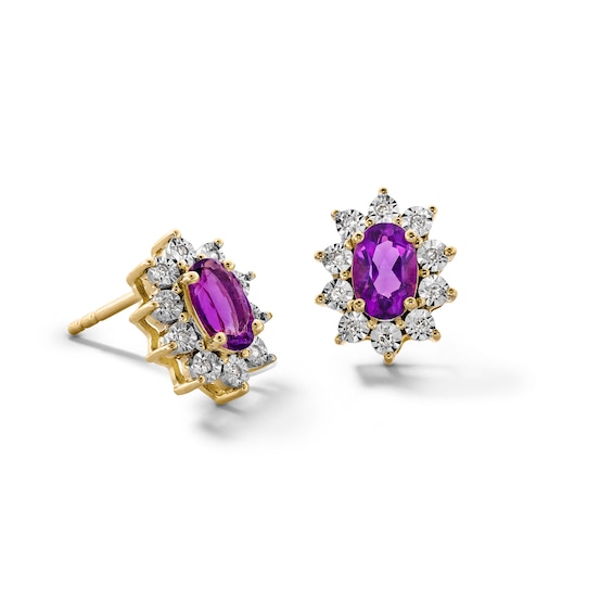 Oval Amethyst and 1/20 CT. T.w. Diamond Sunburst Frame Stud Earrings in 10K Gold