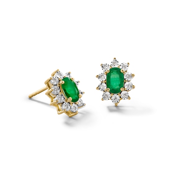 Oval Emerald and 1/20 CT. T.w. Diamond Sunburst Frame Stud Earrings in 10K Gold