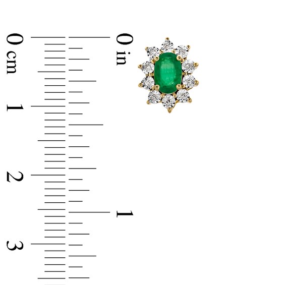 Oval Emerald and 1/20 CT. T.w. Diamond Sunburst Frame Stud Earrings in 10K Gold