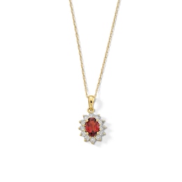 Oval Garnet and Diamond Accent Sunburst Frame Pendant in 10K Gold