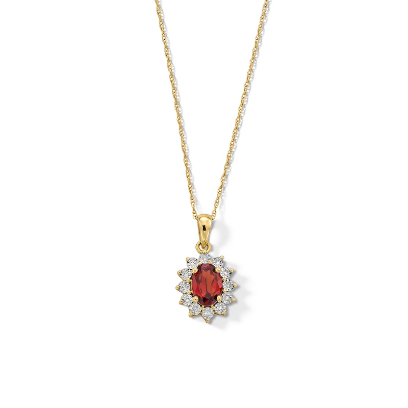 Main Image 1 of Oval Garnet and Diamond Accent Sunburst Frame Pendant in 10K Gold