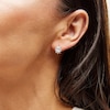Thumbnail Image 2 of Oval White Lab-Created Sapphire and 1/20 CT. T.W. Diamond Sunburst Frame Stud Earrings in 10K Gold