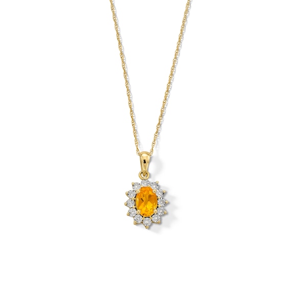 Oval Citrine and Diamond Accent Sunburst Frame Pendant in 10K Gold
