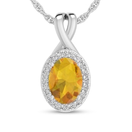 Oval Citrine and 1/15 CT. T.W. Diamond Frame Split Bail Pendant in 10K White Gold