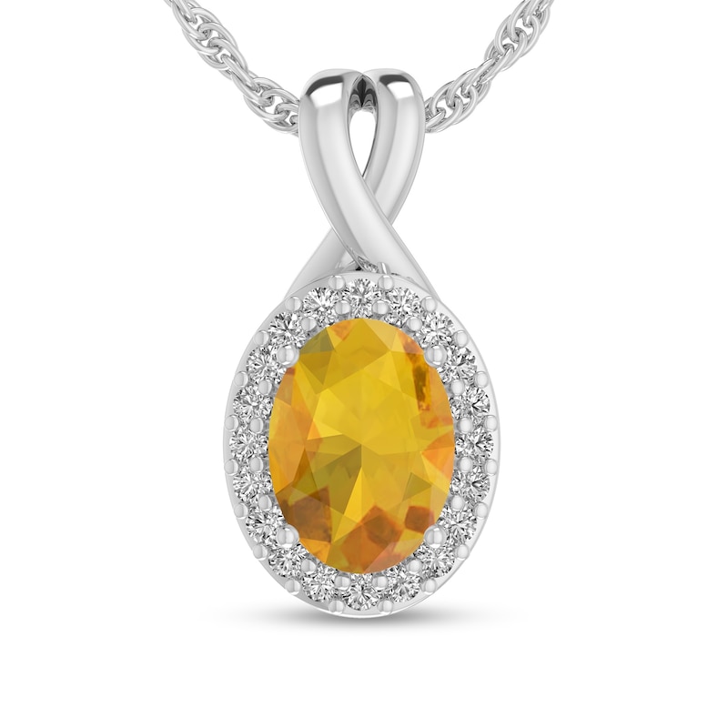 Main Image 1 of Oval Citrine and 1/15 CT. T.W. Diamond Frame Split Bail Pendant in 10K White Gold