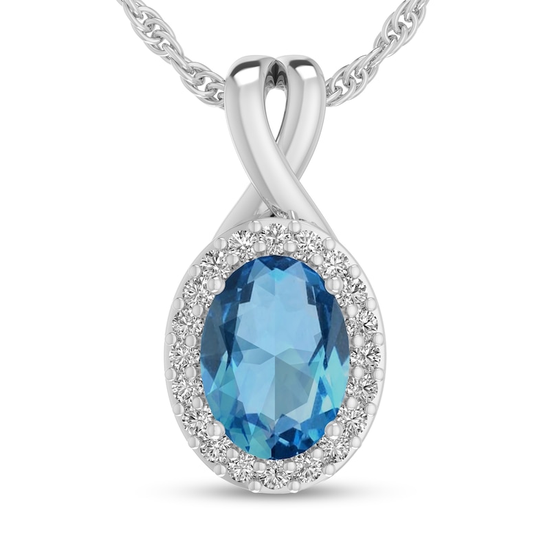 Main Image 1 of Oval Swiss Blue Topaz and 1/15 CT. T.W. Diamond Frame Split Bail Pendant in 10K White Gold