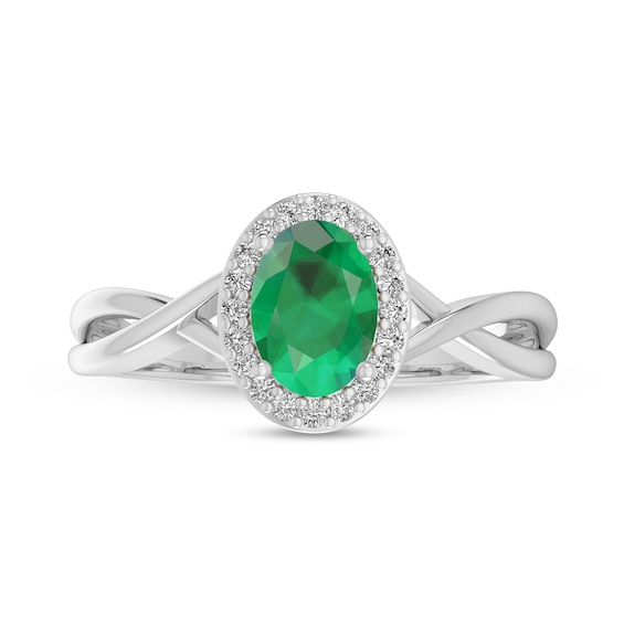 Oval Emerald and 1/15 CT. T.w. Diamond Frame Crossover Shank Ring in 10K White Gold
