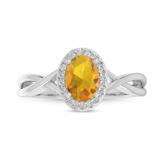 Oval Citrine and 1/15 CT. T.w. Diamond Frame Crossover Shank Ring in 10K White Gold