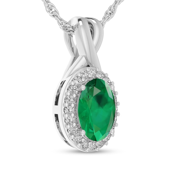 Oval Emerald and 1/15 CT. T.w. Diamond Frame Split Bail Pendant in 10K White Gold