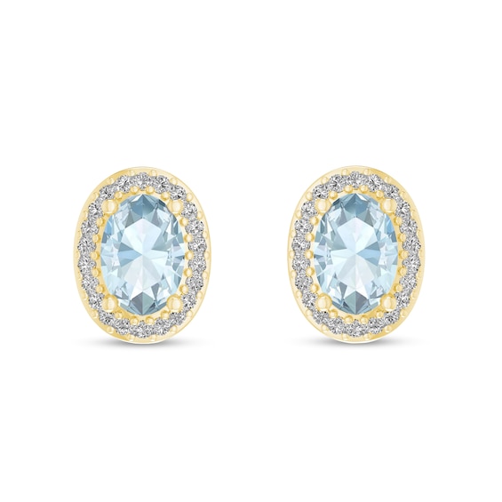 Oval Aquamarine and 1/10 CT. T.w. Diamond Frame Stud Earrings in 10K Gold