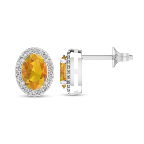 Oval Citrine and 1/10 CT. T.w. Diamond Frame Stud Earrings in 10K White Gold